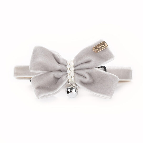 Coral Fleece Pet Bow Tie – Soft, Adjustable & Adorable for Cats and Small Dogs Upgrade your pet’s look instantly with this premium Coral Fleece Bow Tie, designed for comfort, cuteness, and compliments. Whether you're planning a pet photoshoot, celebrating a birthday, or just want your fur baby to stand out, this is the must-have accessory.  ✅ Why You'll Love It Made with Ultra-Soft Coral Fleece – Gentle on your pet’s neck, even with all-day wear  Adjustable Fit – Perfect for kittens, puppies, and small pets (See size guide below)  Lightweight & Comfy – Your pet won’t feel a thing, but everyone else will notice  Stylish Colors & Cute Design – Makes any pet look polished, playful, and ready for attention  Easy to Wear, Easy to Remove – No struggle, no stress  🎯 Perfect For Birthday parties, holidays, pet photos, family gatherings  Everyday walks or adding charm to your pet's look  Pet owners who care about both style and comfort  📏 Size Guide S (Small): 11–22cm (Ideal for small cats and toy breeds)  M (Medium): 23–33cm (Fits most cats and small dogs comfortably)  📦 What’s Included 1 x Coral Fleece Pet Bow Tie - Image 4
